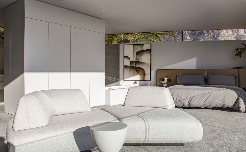 Cranberry Pavilion House prominent with its dark color by Wright Architects