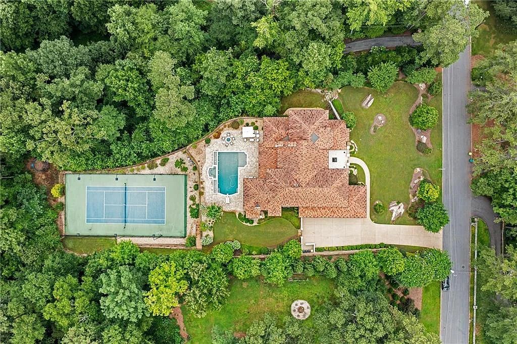 The Estate in Sandy Springs is a luxurious home lending itself to indoor and outdoor entertaining now available for sale. This home located at 4746 Woodvale Dr NW, Sandy Springs, Georgia; offering 05 bedrooms and 09 bathrooms with 11,467 square feet of living spaces. 