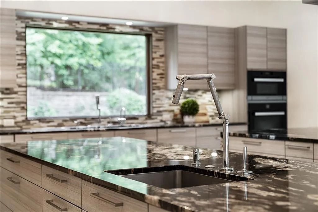 The Estate in Sandy Springs is a luxurious home lending itself to indoor and outdoor entertaining now available for sale. This home located at 4746 Woodvale Dr NW, Sandy Springs, Georgia; offering 05 bedrooms and 09 bathrooms with 11,467 square feet of living spaces. 