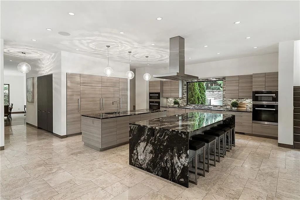 The Estate in Sandy Springs is a luxurious home lending itself to indoor and outdoor entertaining now available for sale. This home located at 4746 Woodvale Dr NW, Sandy Springs, Georgia; offering 05 bedrooms and 09 bathrooms with 11,467 square feet of living spaces. 
