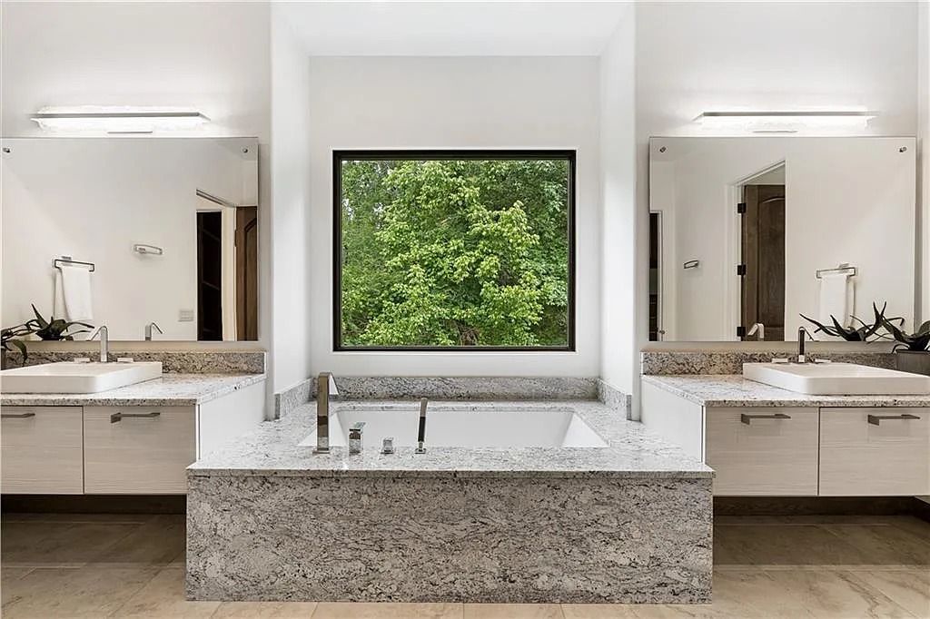 The Estate in Sandy Springs is a luxurious home lending itself to indoor and outdoor entertaining now available for sale. This home located at 4746 Woodvale Dr NW, Sandy Springs, Georgia; offering 05 bedrooms and 09 bathrooms with 11,467 square feet of living spaces. 