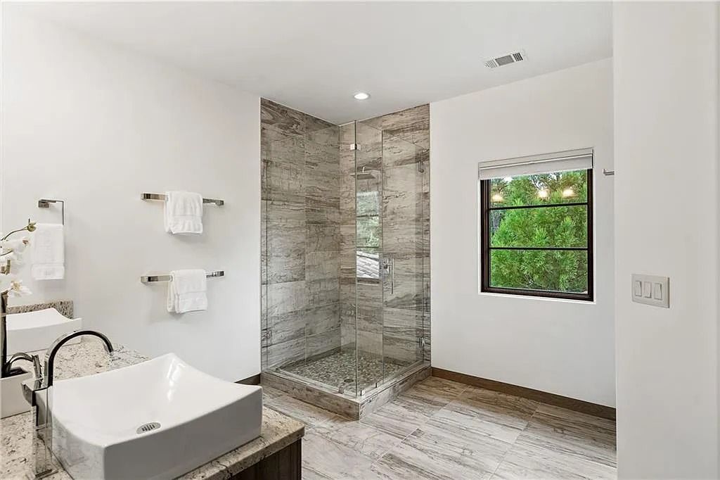 The Estate in Sandy Springs is a luxurious home lending itself to indoor and outdoor entertaining now available for sale. This home located at 4746 Woodvale Dr NW, Sandy Springs, Georgia; offering 05 bedrooms and 09 bathrooms with 11,467 square feet of living spaces. 