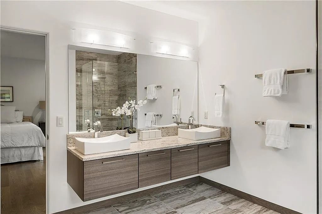 The Estate in Sandy Springs is a luxurious home lending itself to indoor and outdoor entertaining now available for sale. This home located at 4746 Woodvale Dr NW, Sandy Springs, Georgia; offering 05 bedrooms and 09 bathrooms with 11,467 square feet of living spaces. 