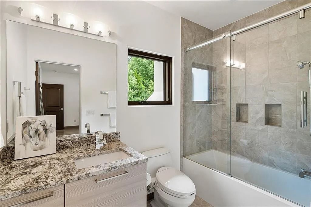 The Estate in Sandy Springs is a luxurious home lending itself to indoor and outdoor entertaining now available for sale. This home located at 4746 Woodvale Dr NW, Sandy Springs, Georgia; offering 05 bedrooms and 09 bathrooms with 11,467 square feet of living spaces. 