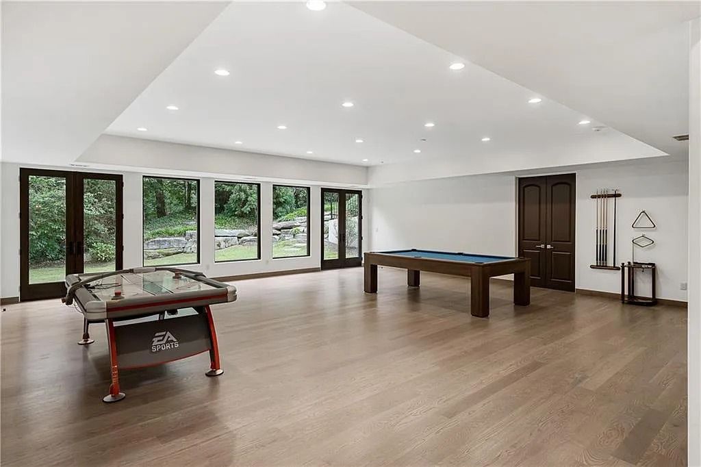The Estate in Sandy Springs is a luxurious home lending itself to indoor and outdoor entertaining now available for sale. This home located at 4746 Woodvale Dr NW, Sandy Springs, Georgia; offering 05 bedrooms and 09 bathrooms with 11,467 square feet of living spaces. 