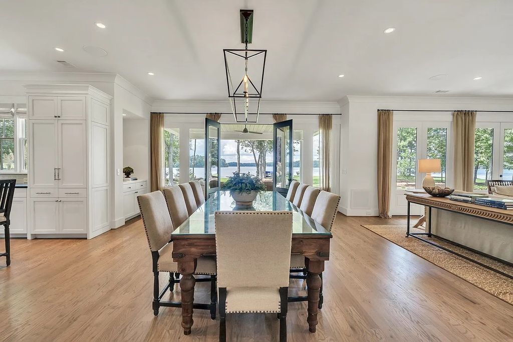 The House in Eatonton boasts gorgeous landscaping and 180 degree views of Lake Oconee, now available for sale. This home located at 158 Bradford Dr, Eatonton, Georgia