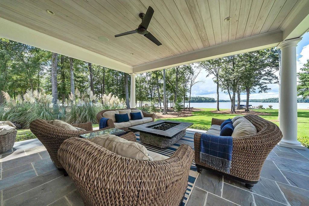 The House in Eatonton boasts gorgeous landscaping and 180 degree views of Lake Oconee, now available for sale. This home located at 158 Bradford Dr, Eatonton, Georgia