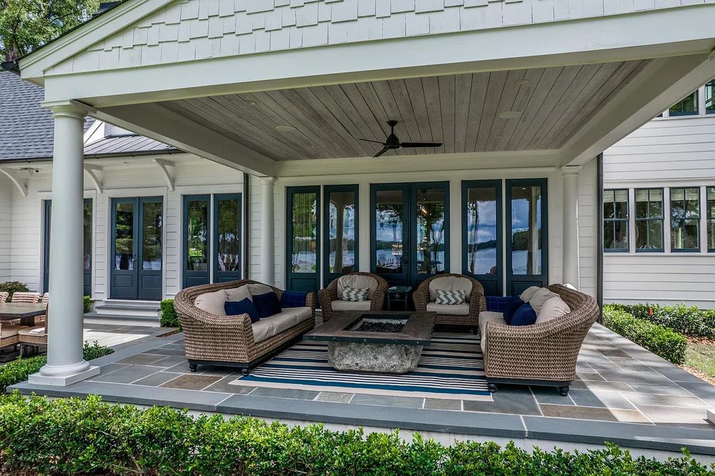 The House in Eatonton boasts gorgeous landscaping and 180 degree views of Lake Oconee, now available for sale. This home located at 158 Bradford Dr, Eatonton, Georgia