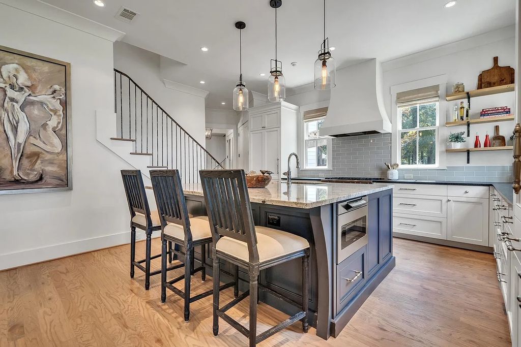 The House in Eatonton boasts gorgeous landscaping and 180 degree views of Lake Oconee, now available for sale. This home located at 158 Bradford Dr, Eatonton, Georgia