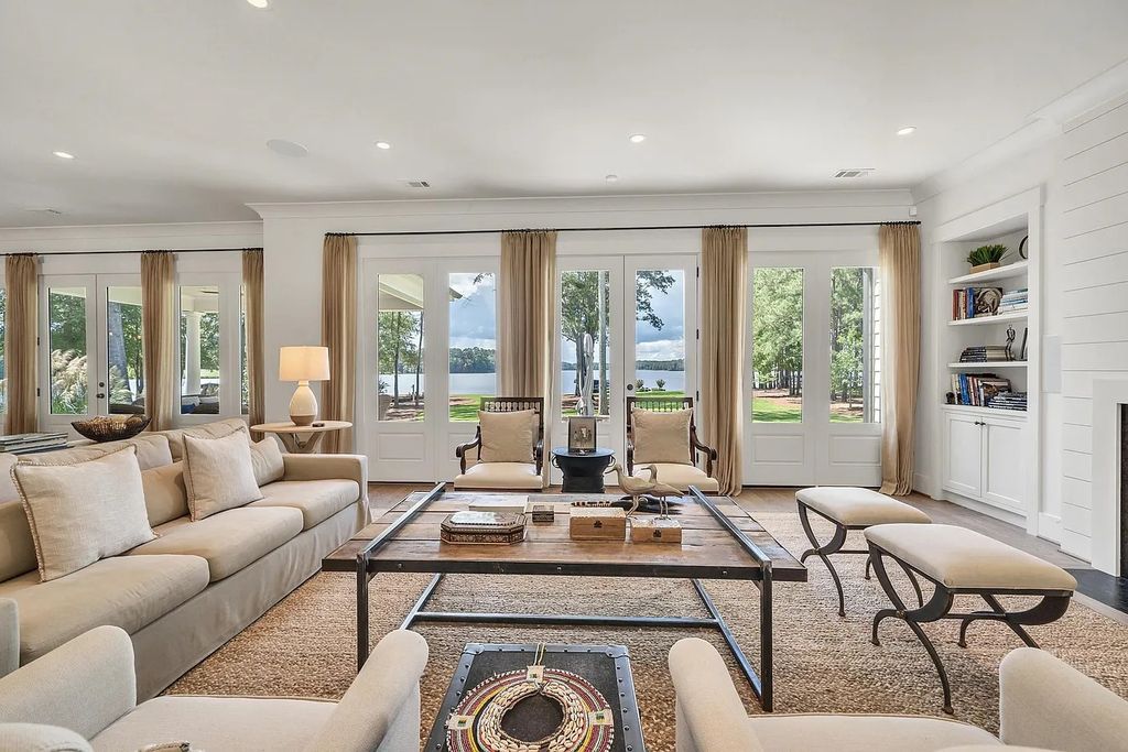 The House in Eatonton boasts gorgeous landscaping and 180 degree views of Lake Oconee, now available for sale. This home located at 158 Bradford Dr, Eatonton, Georgia