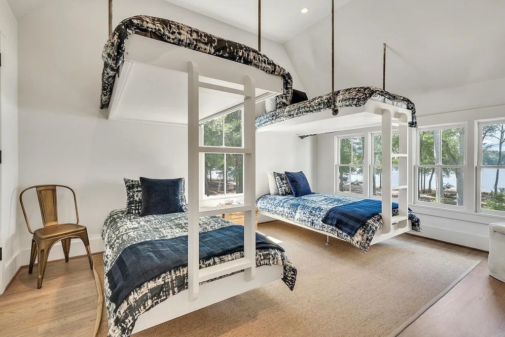 The House in Eatonton boasts gorgeous landscaping and 180 degree views of Lake Oconee, now available for sale. This home located at 158 Bradford Dr, Eatonton, Georgia