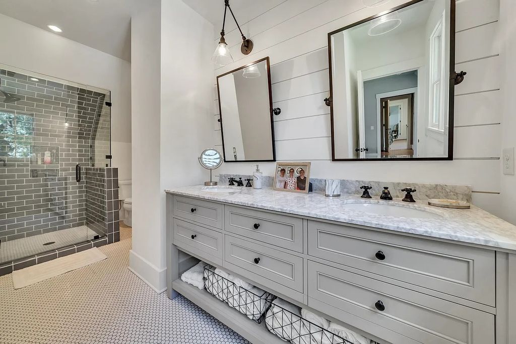 The House in Eatonton boasts gorgeous landscaping and 180 degree views of Lake Oconee, now available for sale. This home located at 158 Bradford Dr, Eatonton, Georgia