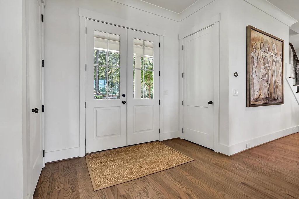 The House in Eatonton boasts gorgeous landscaping and 180 degree views of Lake Oconee, now available for sale. This home located at 158 Bradford Dr, Eatonton, Georgia