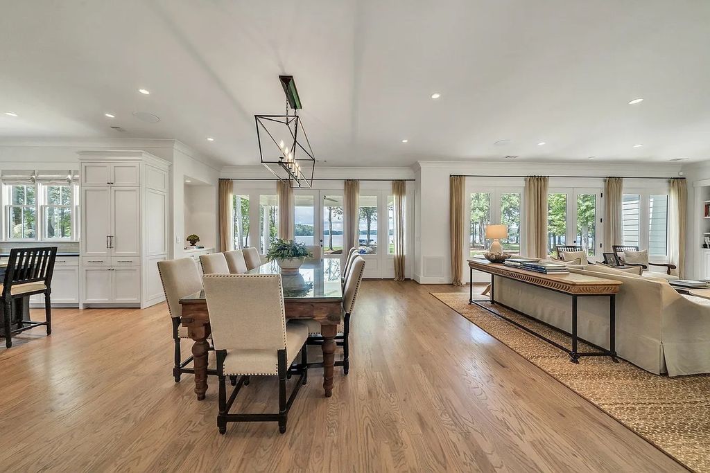 The House in Eatonton boasts gorgeous landscaping and 180 degree views of Lake Oconee, now available for sale. This home located at 158 Bradford Dr, Eatonton, Georgia