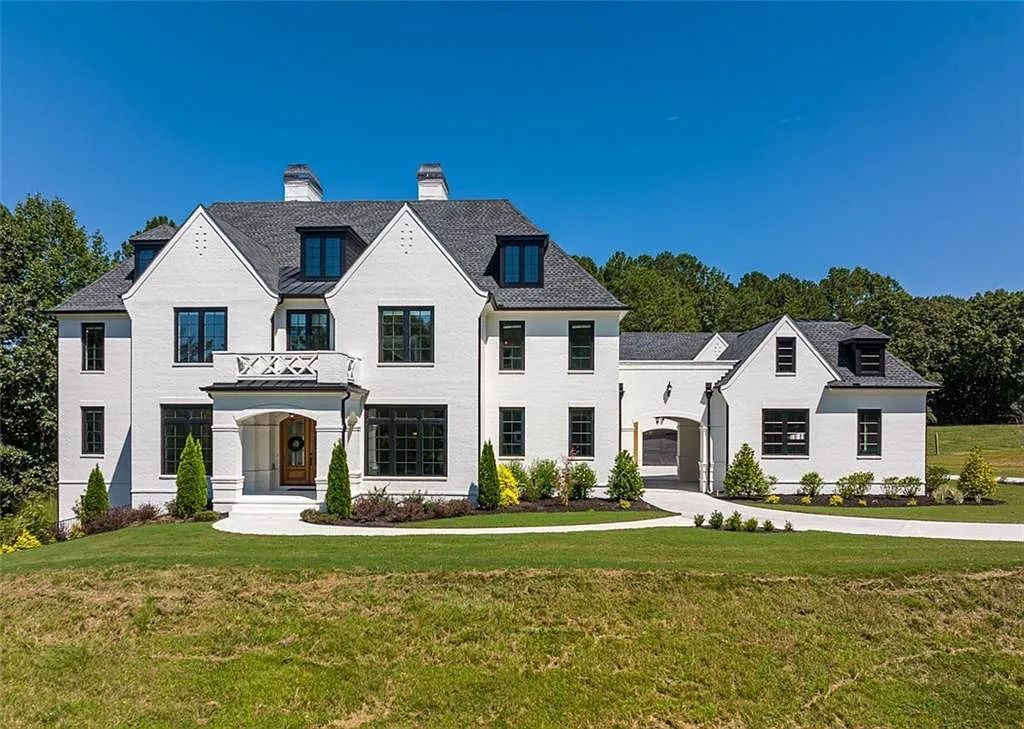 The House in Canton includes a Barndominium guest house, multiple creeks and fenced pastures perfect for horses, now available for sale. This home located at 1661 Harmony Dr, Canton, Georgia