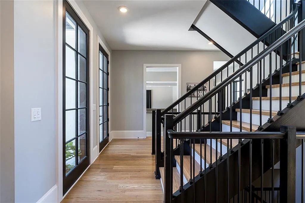 The House in Canton includes a Barndominium guest house, multiple creeks and fenced pastures perfect for horses, now available for sale. This home located at 1661 Harmony Dr, Canton, Georgia