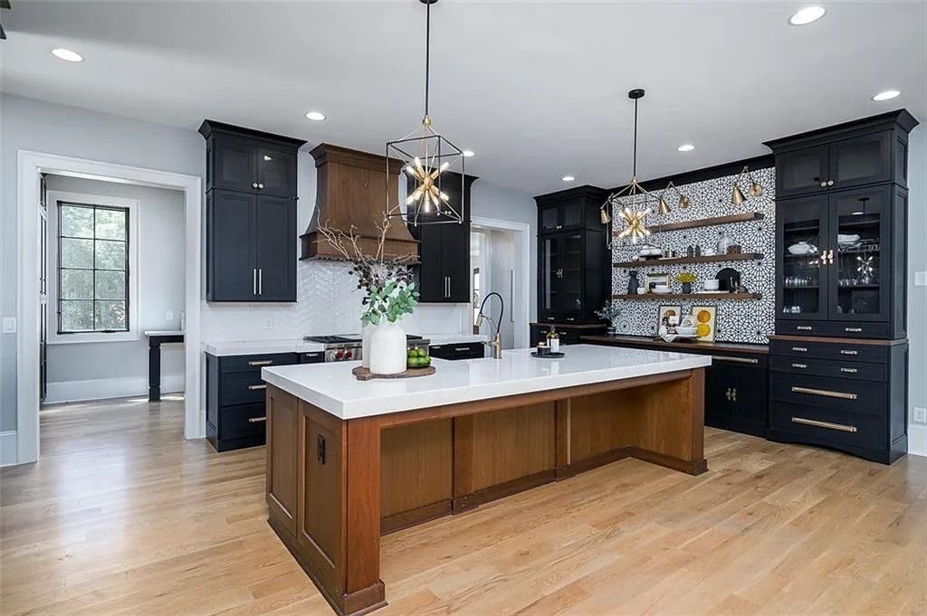 The House in Canton includes a Barndominium guest house, multiple creeks and fenced pastures perfect for horses, now available for sale. This home located at 1661 Harmony Dr, Canton, Georgia