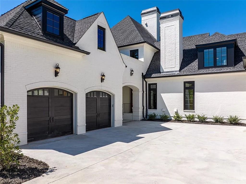 The House in Canton includes a Barndominium guest house, multiple creeks and fenced pastures perfect for horses, now available for sale. This home located at 1661 Harmony Dr, Canton, Georgia