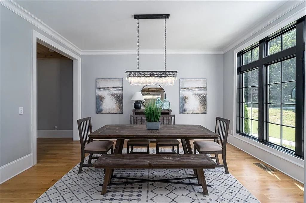 The House in Canton includes a Barndominium guest house, multiple creeks and fenced pastures perfect for horses, now available for sale. This home located at 1661 Harmony Dr, Canton, Georgia