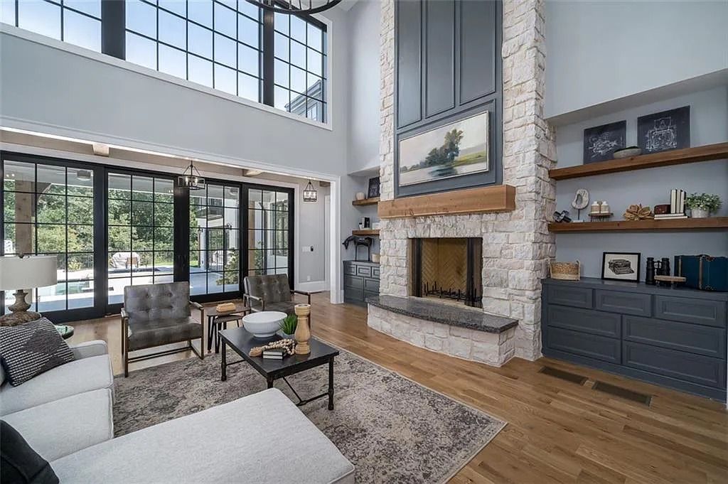 The House in Canton includes a Barndominium guest house, multiple creeks and fenced pastures perfect for horses, now available for sale. This home located at 1661 Harmony Dr, Canton, Georgia