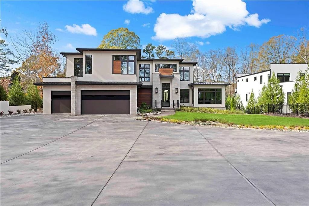 The Estate in Atlanta is a luxurious home with an open concept floor plan featuring gorgeous white oak hardwood flooring throughout, now available for sale. This home located at 1107 Moores Mill Rd NW, Atlanta, Georgia
