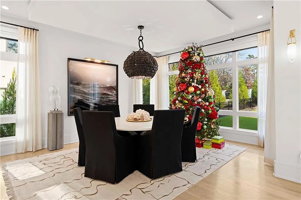 The Estate in Atlanta is a luxurious home with an open concept floor plan featuring gorgeous white oak hardwood flooring throughout, now available for sale. This home located at 1107 Moores Mill Rd NW, Atlanta, Georgia