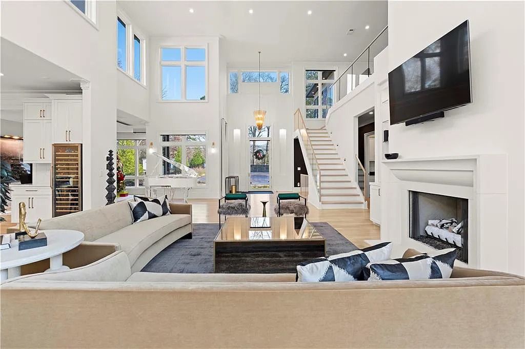The Estate in Atlanta is a luxurious home with an open concept floor plan featuring gorgeous white oak hardwood flooring throughout, now available for sale. This home located at 1107 Moores Mill Rd NW, Atlanta, Georgia