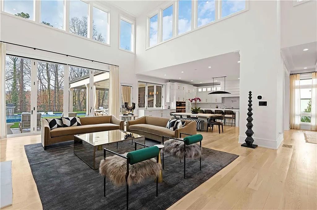 The Estate in Atlanta is a luxurious home with an open concept floor plan featuring gorgeous white oak hardwood flooring throughout, now available for sale. This home located at 1107 Moores Mill Rd NW, Atlanta, Georgia