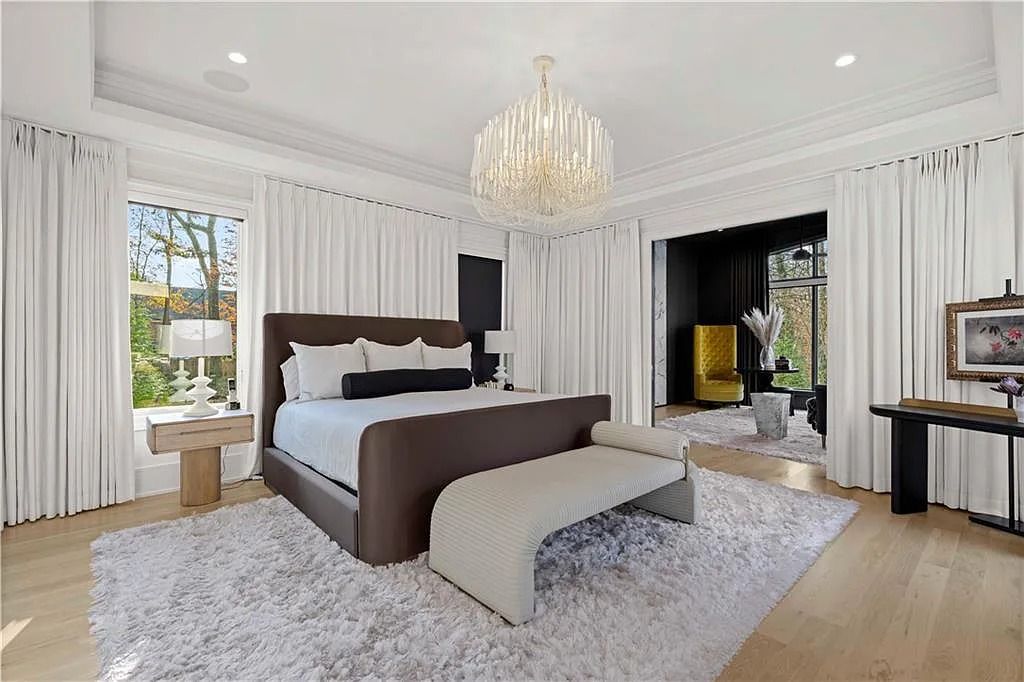 The Estate in Atlanta is a luxurious home with an open concept floor plan featuring gorgeous white oak hardwood flooring throughout, now available for sale. This home located at 1107 Moores Mill Rd NW, Atlanta, Georgia