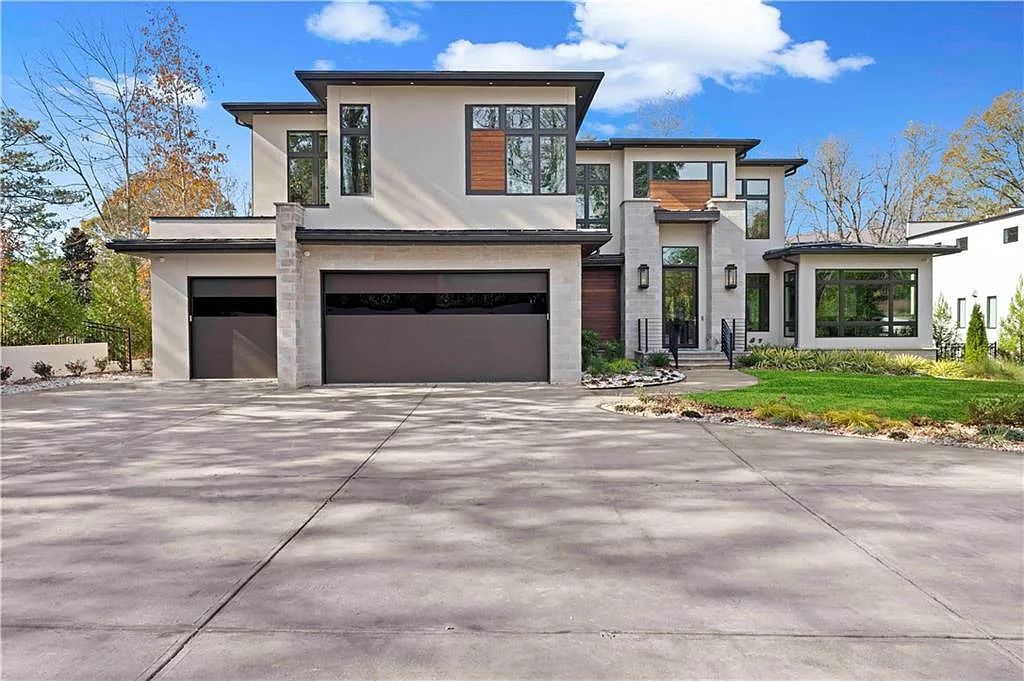 The Estate in Atlanta is a luxurious home with an open concept floor plan featuring gorgeous white oak hardwood flooring throughout, now available for sale. This home located at 1107 Moores Mill Rd NW, Atlanta, Georgia
