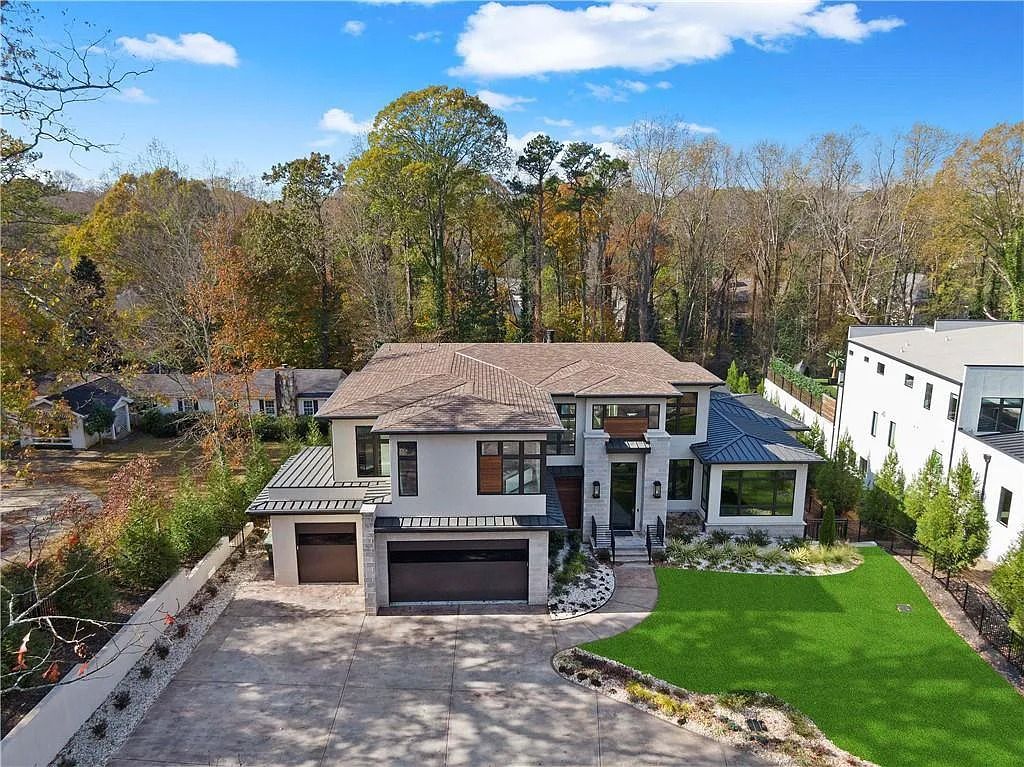 The Estate in Atlanta is a luxurious home with an open concept floor plan featuring gorgeous white oak hardwood flooring throughout, now available for sale. This home located at 1107 Moores Mill Rd NW, Atlanta, Georgia