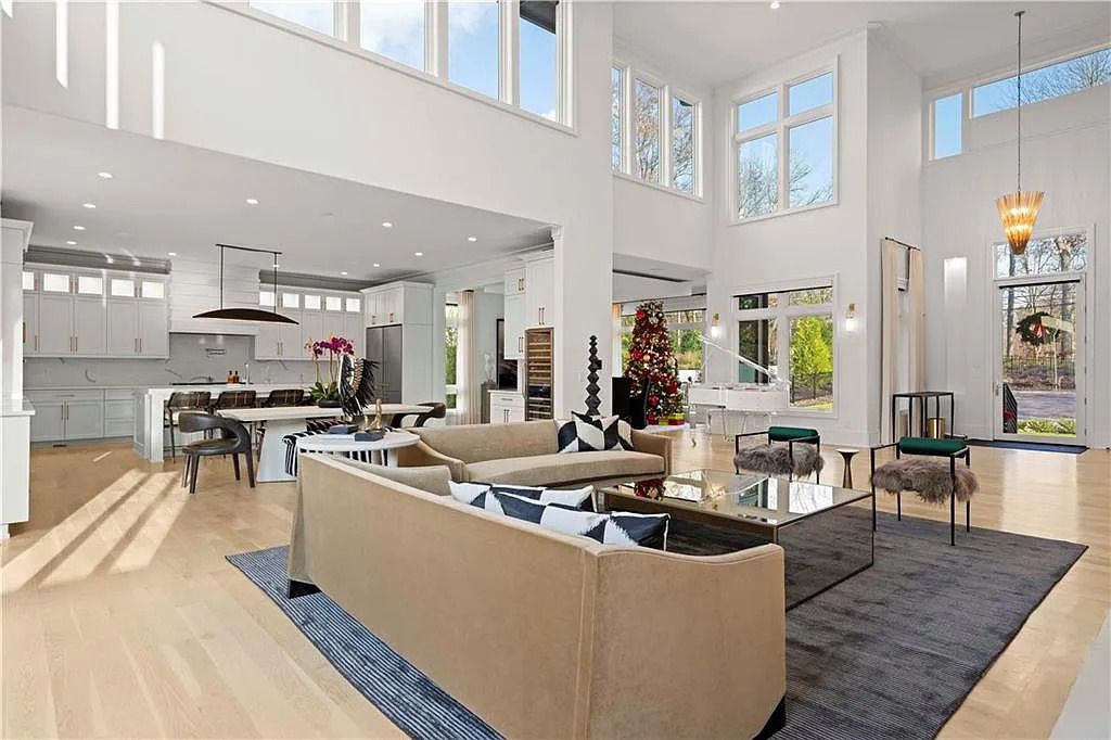 The Estate in Atlanta is a luxurious home with an open concept floor plan featuring gorgeous white oak hardwood flooring throughout, now available for sale. This home located at 1107 Moores Mill Rd NW, Atlanta, Georgia