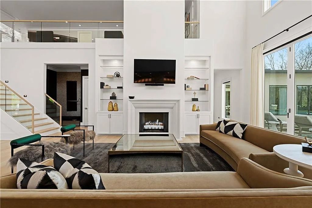 The Estate in Atlanta is a luxurious home with an open concept floor plan featuring gorgeous white oak hardwood flooring throughout, now available for sale. This home located at 1107 Moores Mill Rd NW, Atlanta, Georgia