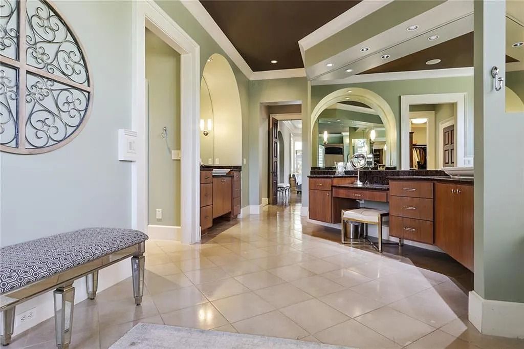 The Home in Kennesaw is the entertainers delight with large open spaces and a salt water pool with a connecting hot tub and wine cellar, now available for sale. This home located at 4235 Old Stilesboro Rd NW, Kennesaw, Georgia