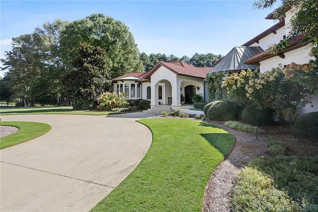 The Home in Kennesaw is the entertainers delight with large open spaces and a salt water pool with a connecting hot tub and wine cellar, now available for sale. This home located at 4235 Old Stilesboro Rd NW, Kennesaw, Georgia