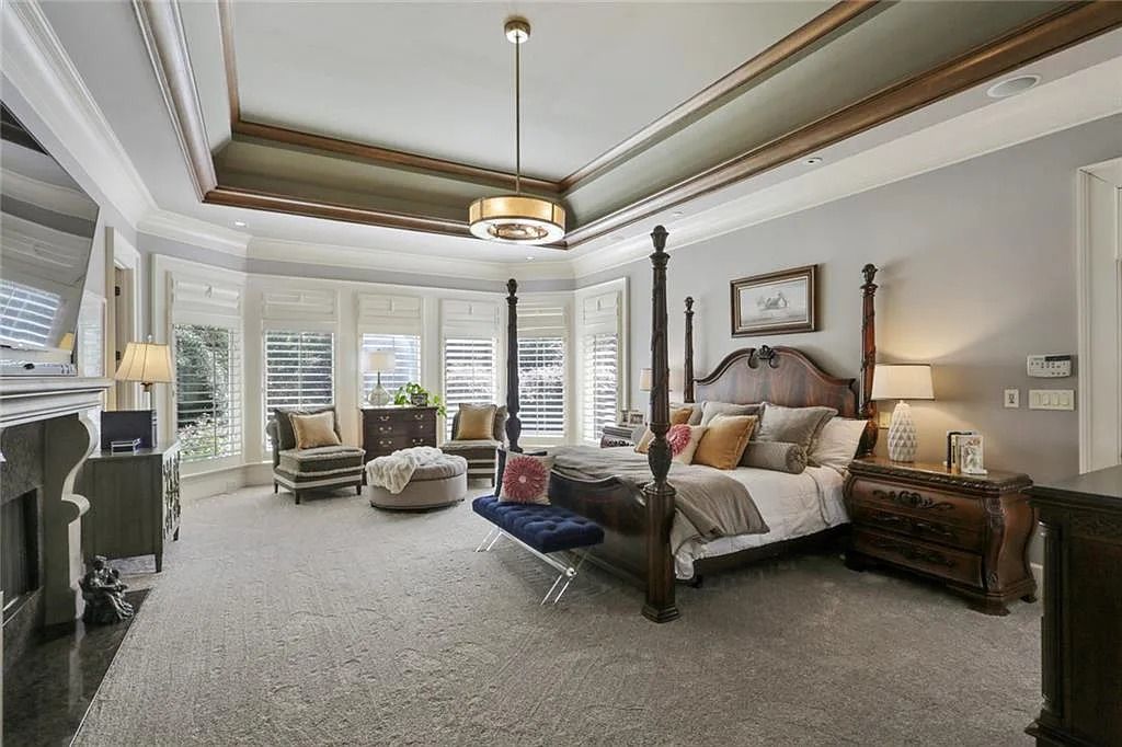 The Home in Kennesaw is the entertainers delight with large open spaces and a salt water pool with a connecting hot tub and wine cellar, now available for sale. This home located at 4235 Old Stilesboro Rd NW, Kennesaw, Georgia