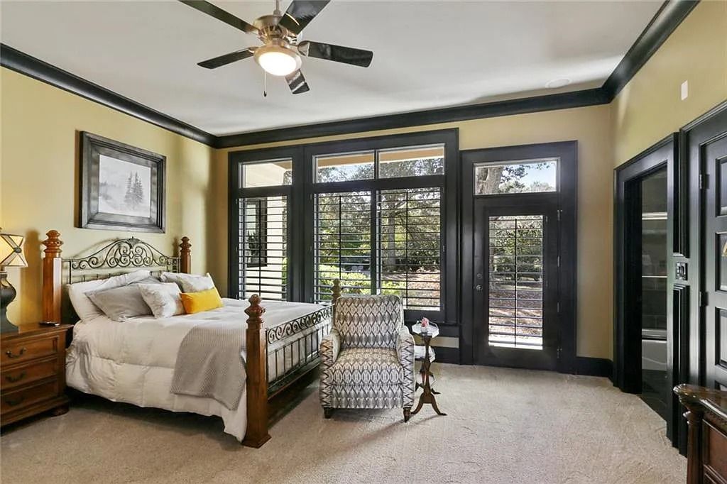 The Home in Kennesaw is the entertainers delight with large open spaces and a salt water pool with a connecting hot tub and wine cellar, now available for sale. This home located at 4235 Old Stilesboro Rd NW, Kennesaw, Georgia