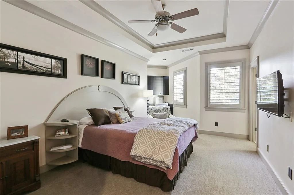 The Home in Kennesaw is the entertainers delight with large open spaces and a salt water pool with a connecting hot tub and wine cellar, now available for sale. This home located at 4235 Old Stilesboro Rd NW, Kennesaw, Georgia