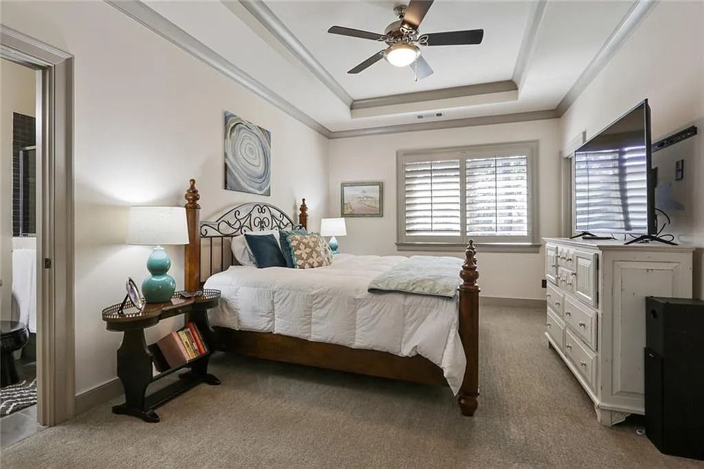 The Home in Kennesaw is the entertainers delight with large open spaces and a salt water pool with a connecting hot tub and wine cellar, now available for sale. This home located at 4235 Old Stilesboro Rd NW, Kennesaw, Georgia