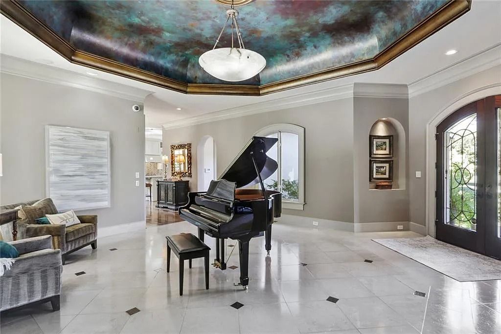 The Home in Kennesaw is the entertainers delight with large open spaces and a salt water pool with a connecting hot tub and wine cellar, now available for sale. This home located at 4235 Old Stilesboro Rd NW, Kennesaw, Georgia