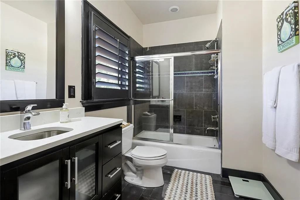 The Home in Kennesaw is the entertainers delight with large open spaces and a salt water pool with a connecting hot tub and wine cellar, now available for sale. This home located at 4235 Old Stilesboro Rd NW, Kennesaw, Georgia