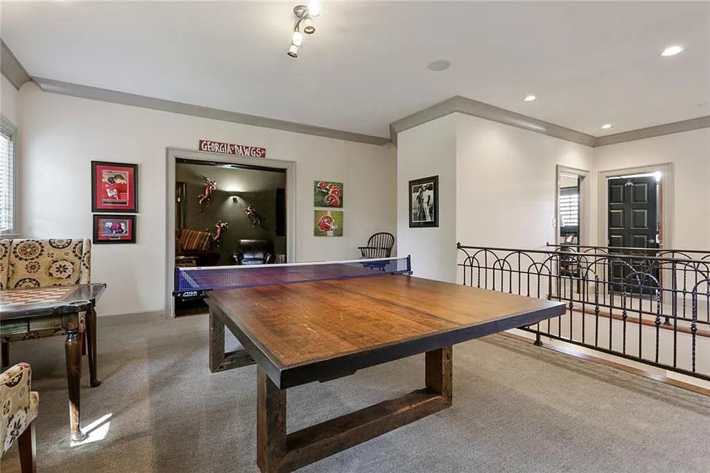 The Home in Kennesaw is the entertainers delight with large open spaces and a salt water pool with a connecting hot tub and wine cellar, now available for sale. This home located at 4235 Old Stilesboro Rd NW, Kennesaw, Georgia