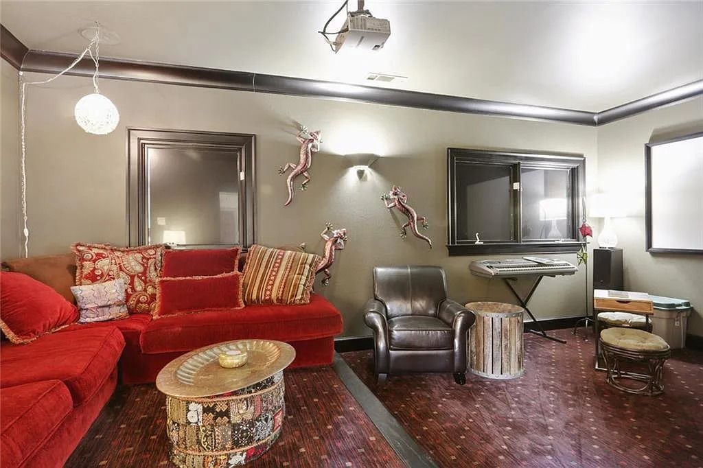 The Home in Kennesaw is the entertainers delight with large open spaces and a salt water pool with a connecting hot tub and wine cellar, now available for sale. This home located at 4235 Old Stilesboro Rd NW, Kennesaw, Georgia