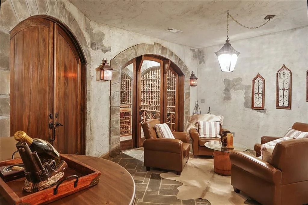 The Home in Kennesaw is the entertainers delight with large open spaces and a salt water pool with a connecting hot tub and wine cellar, now available for sale. This home located at 4235 Old Stilesboro Rd NW, Kennesaw, Georgia