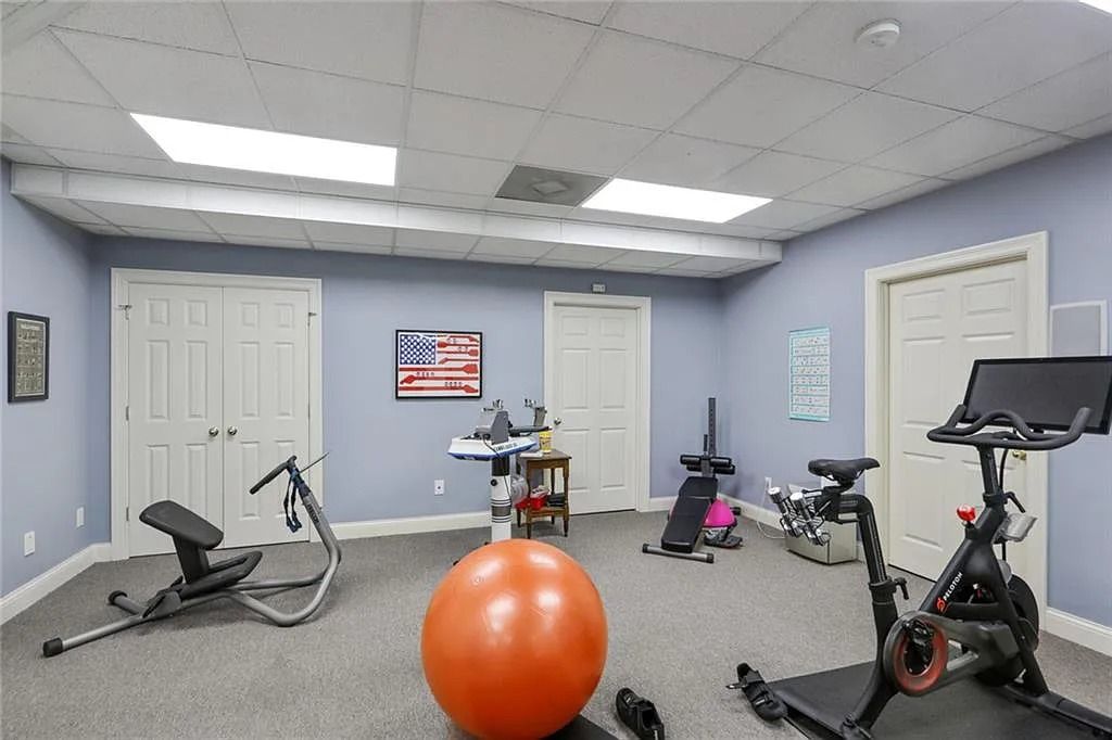 The Home in Kennesaw is the entertainers delight with large open spaces and a salt water pool with a connecting hot tub and wine cellar, now available for sale. This home located at 4235 Old Stilesboro Rd NW, Kennesaw, Georgia
