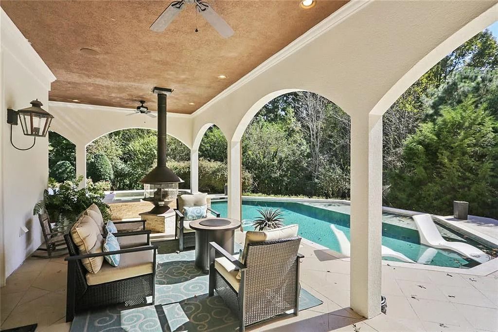 The Home in Kennesaw is the entertainers delight with large open spaces and a salt water pool with a connecting hot tub and wine cellar, now available for sale. This home located at 4235 Old Stilesboro Rd NW, Kennesaw, Georgia