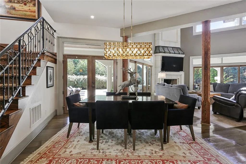 The Home in Kennesaw is the entertainers delight with large open spaces and a salt water pool with a connecting hot tub and wine cellar, now available for sale. This home located at 4235 Old Stilesboro Rd NW, Kennesaw, Georgia