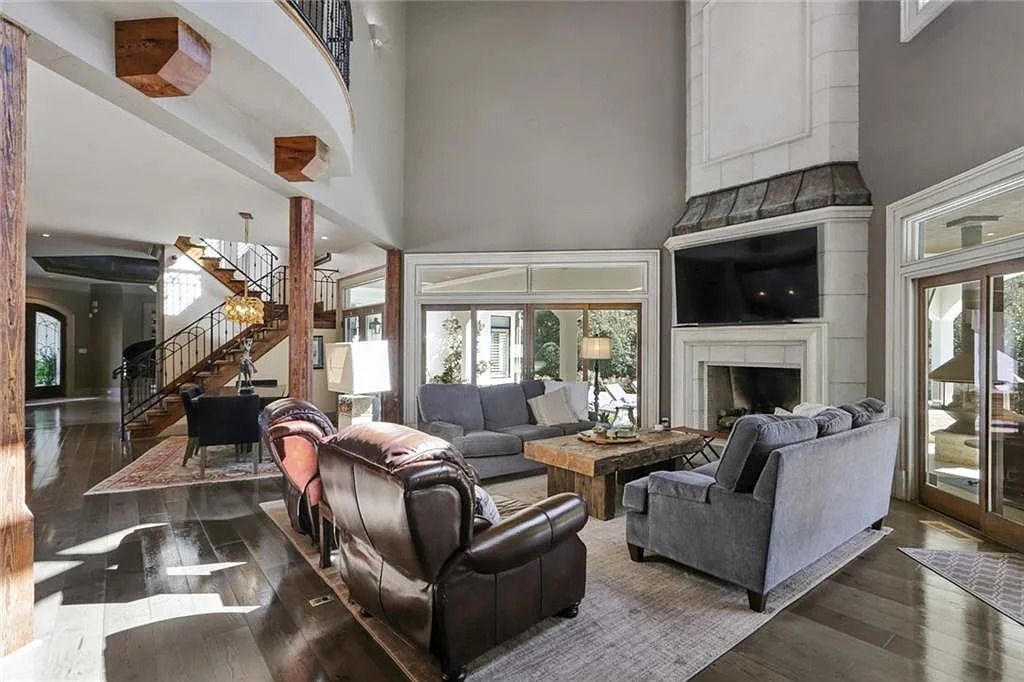 The Home in Kennesaw is the entertainers delight with large open spaces and a salt water pool with a connecting hot tub and wine cellar, now available for sale. This home located at 4235 Old Stilesboro Rd NW, Kennesaw, Georgia