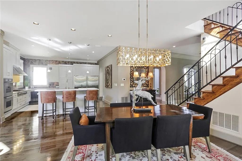The Home in Kennesaw is the entertainers delight with large open spaces and a salt water pool with a connecting hot tub and wine cellar, now available for sale. This home located at 4235 Old Stilesboro Rd NW, Kennesaw, Georgia
