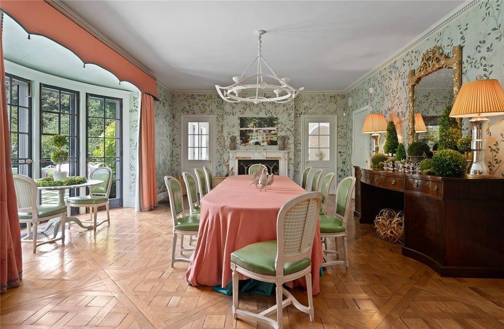 339 Duck Pond Road, Locust Valley, New York is a one of a kind home originally built in 1926 in the prestigious Village of Matinecock with exceptional amenities including a pool, pool house, tennis court, outdoor kitchen, gardens and terraces. elevator, nest system, 3,000 bottle wine cellar, art studio and more.